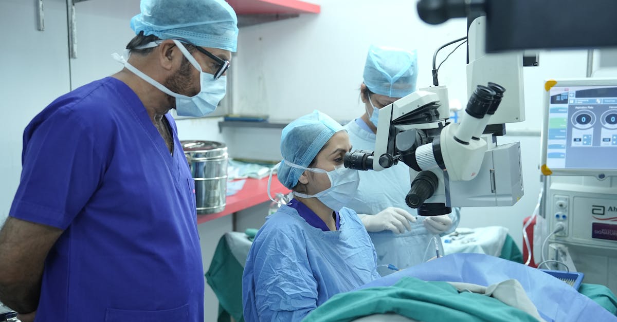 Surgeons performing eye surgery in a New Delhi hospital operating room.